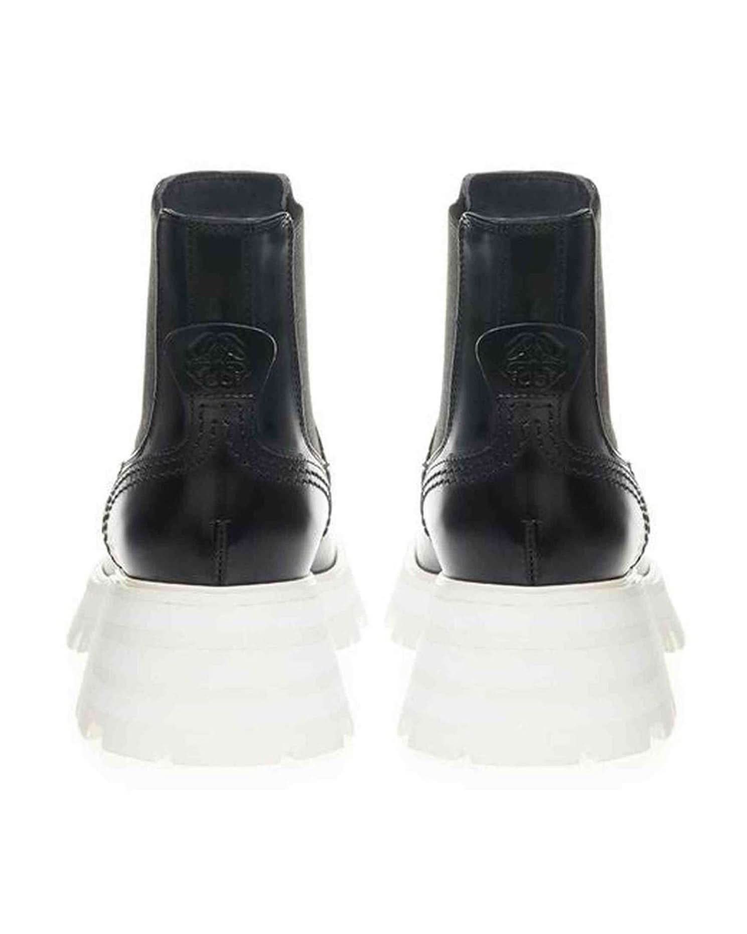 Alexander Mcqueen Black Elegant Leather Boots In Timeless Boots