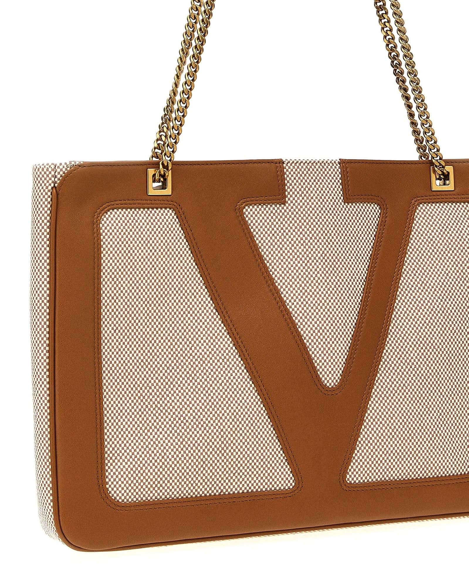 Valentino Garavani Viva Superstar Midi Shopping Bag Glam Steals