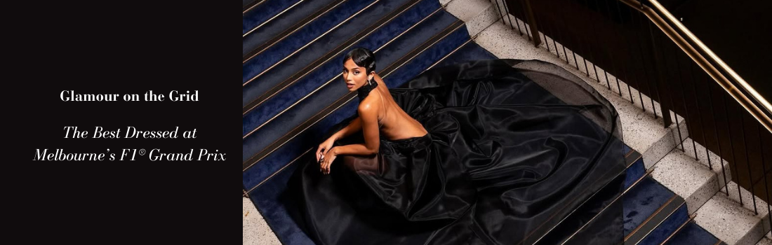 A woman in a black backless gown